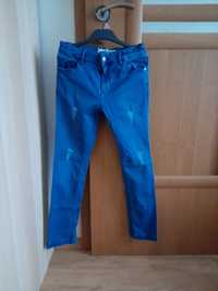 Spodnie jeansowe r. 140
