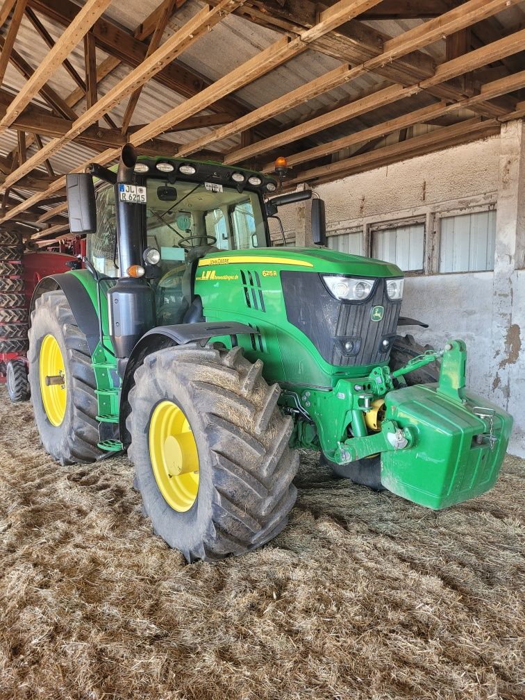 John Deere 6215R z Niemiec