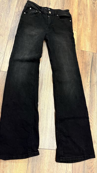 Джинси кльош чорного кольору