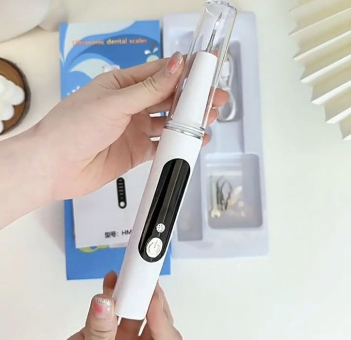 Скалер. Іригатор. Прилад для видалення зубного каменю.