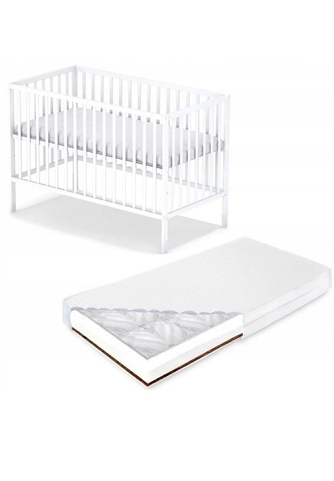 Białe łóżeczko niemowlęce z materacem