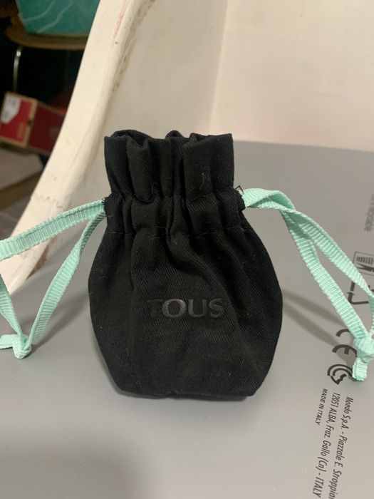 Crucifixo boina saco da Furla e outros