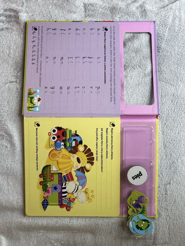 2 Ksiazki: 1 z magnesami i miasto zagubionych rzeczy szukaj znajdz