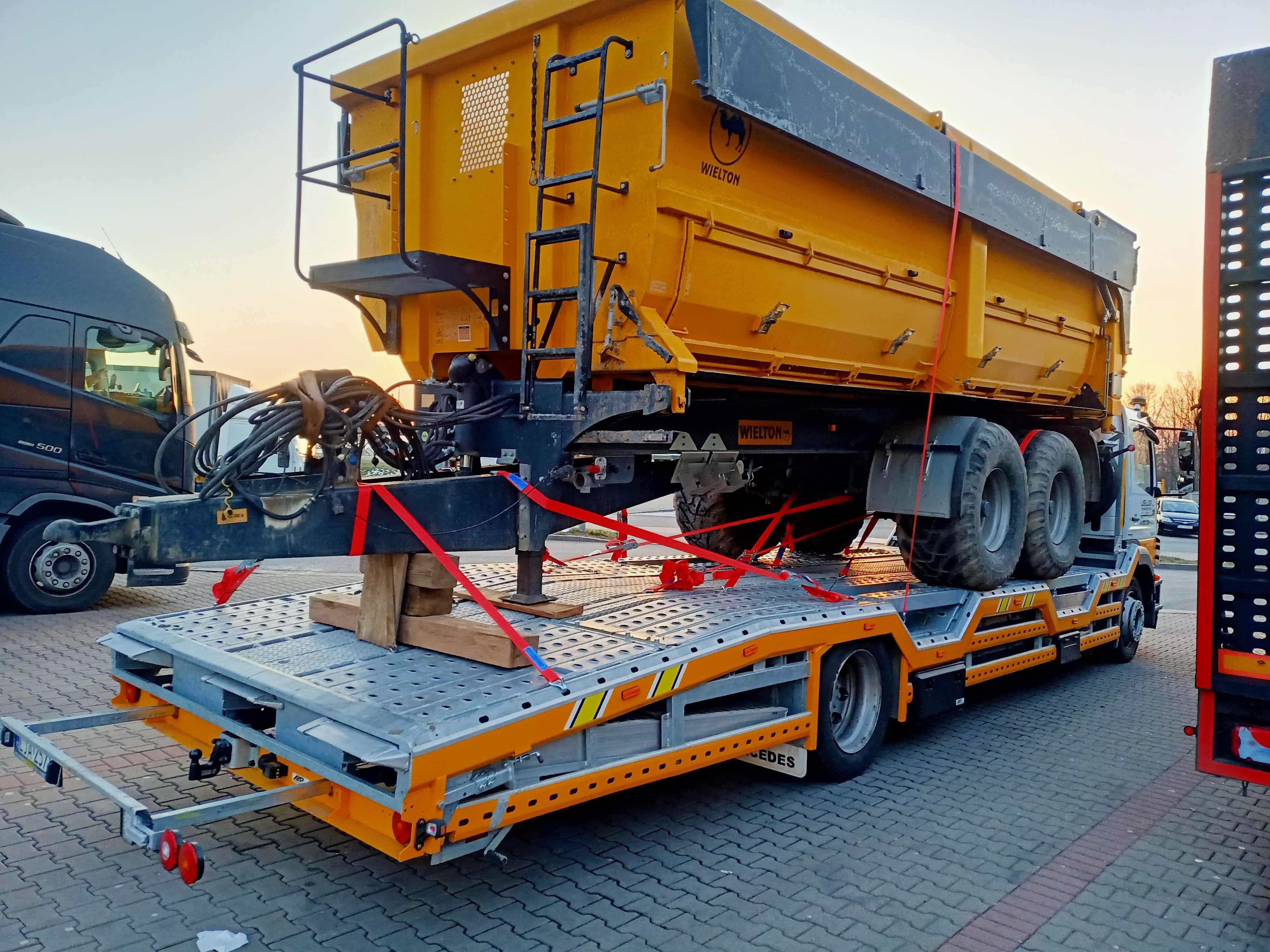 Pomoc drogowa , transport maszyn laweta autolaweta usługi transportowe