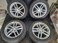 Felgi aluminiowe 17" Audi Volkswagen Skoda 5x112 z oponami zimowymi.