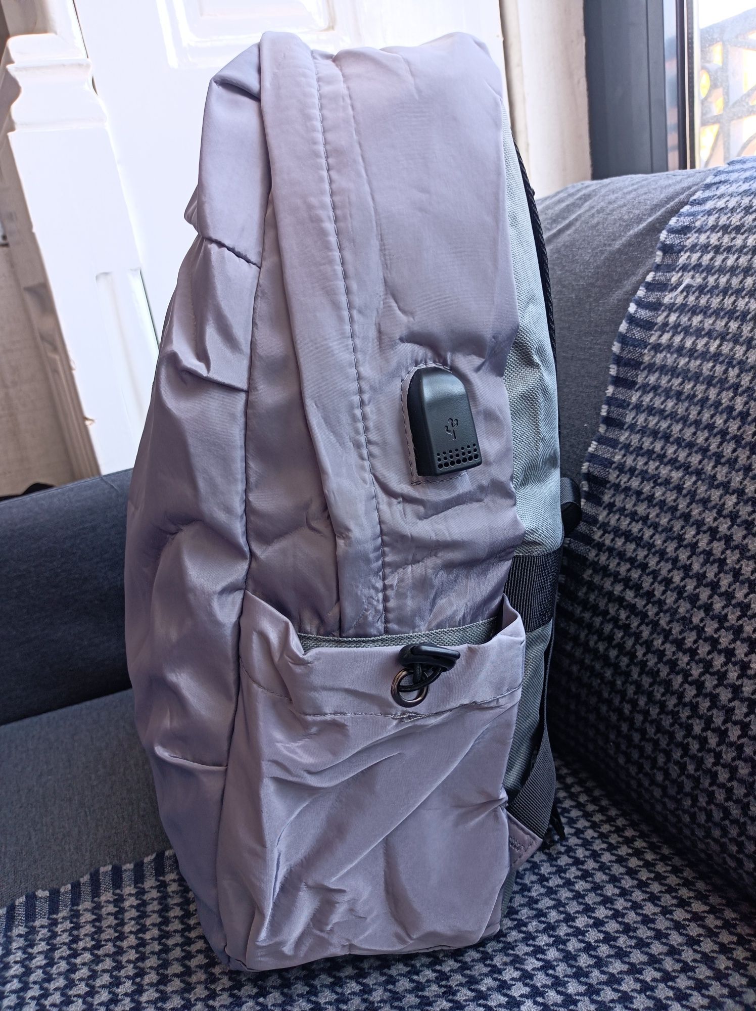 Mochila cinza nova