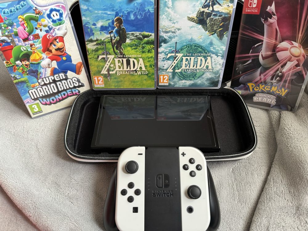 Nintendo Switch OLED (como nova) + jogos