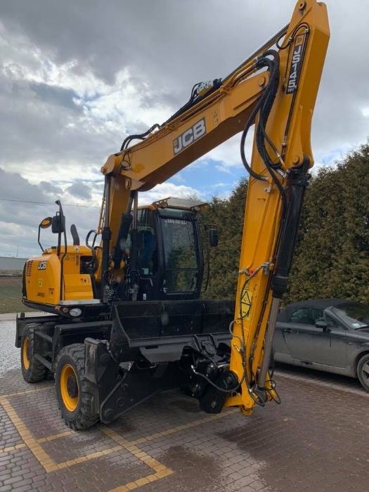 Roboty ziemne Giebułtów Kraków koparka obrotowa kołowa JCB JS145W