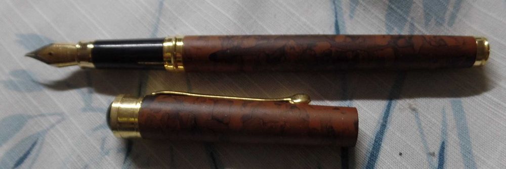 Conjunto de 2 canetas mais 1 abre cartas (69)