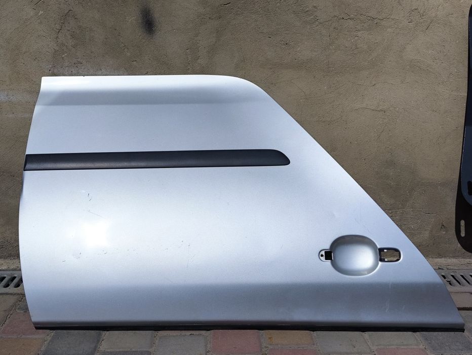 Шуба, від двері Volkswagen Golf (Гольф) 5