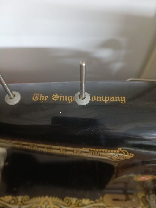 Máquina de costura singer