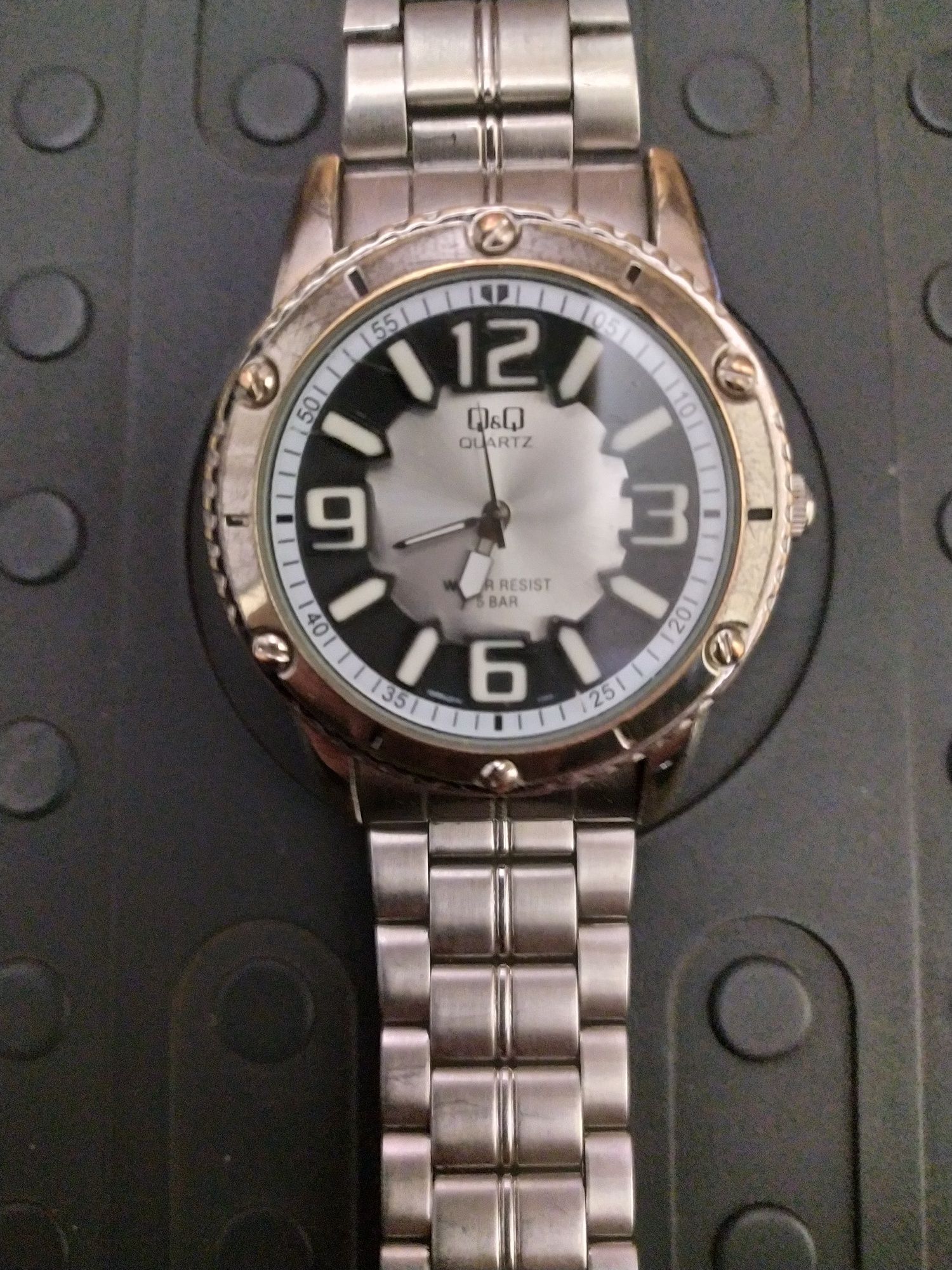 Годинник "Casio" та Q&Q