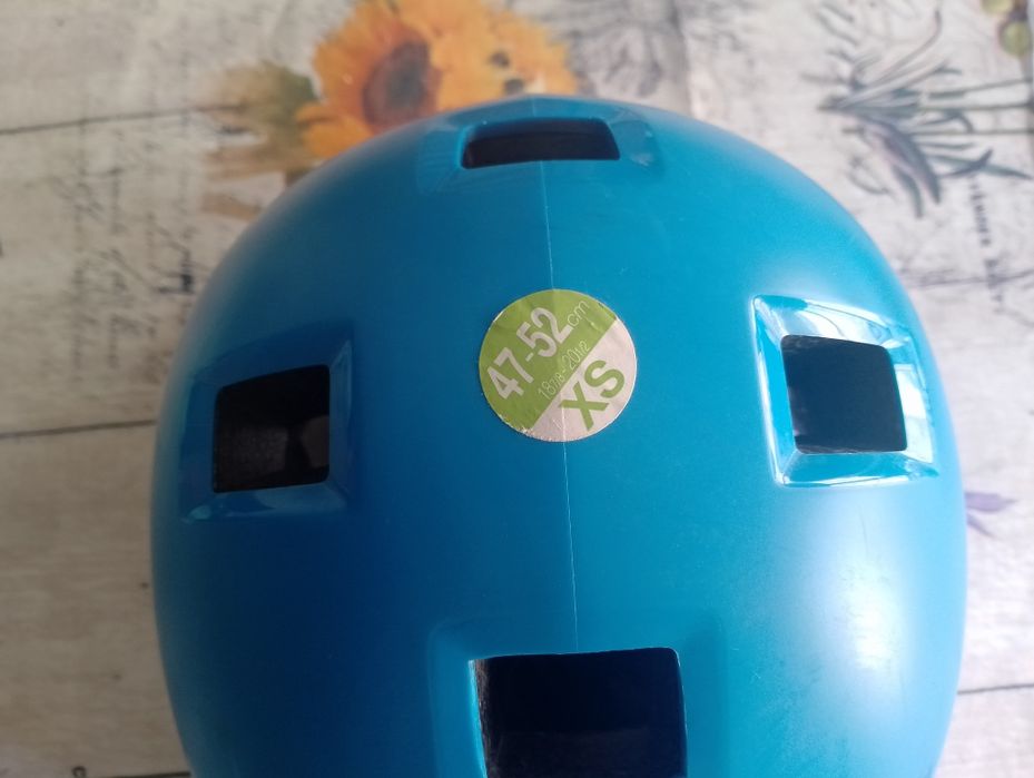 Capacete e proteções para criança.