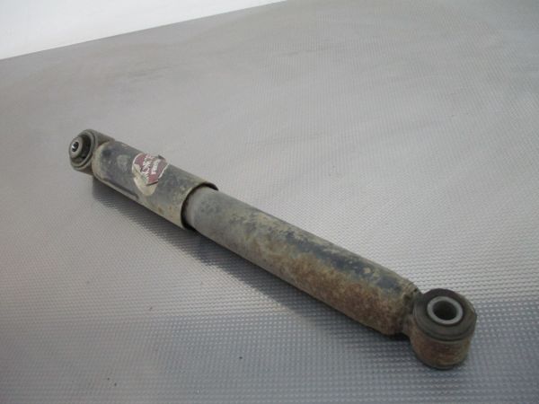 Amortecedor trás esquerdo OPEL Astra H Hatchback (L48)