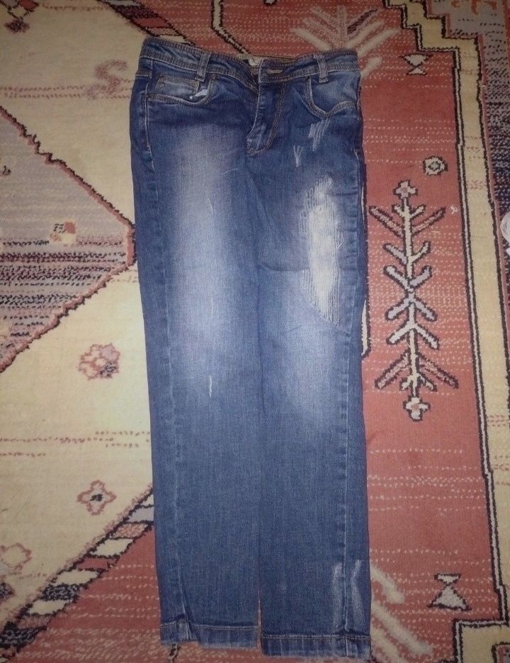 Spodnie  jeans 128 przetarcia