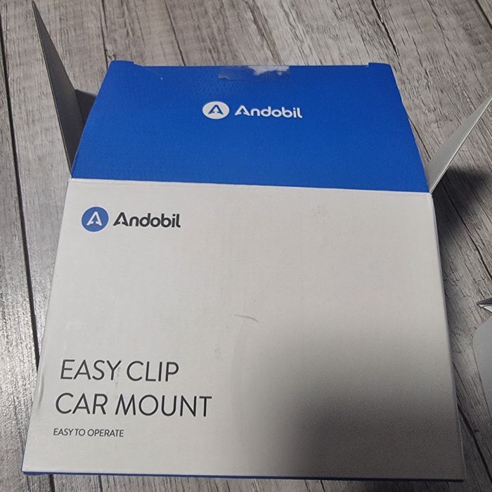 Uchwyt na telefon na kratkę