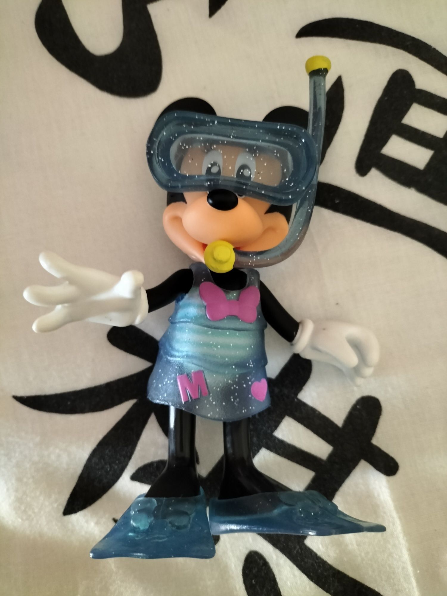 Boneca Minnie com várias roupas