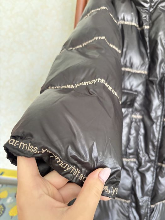 Теплюща зимова куртка