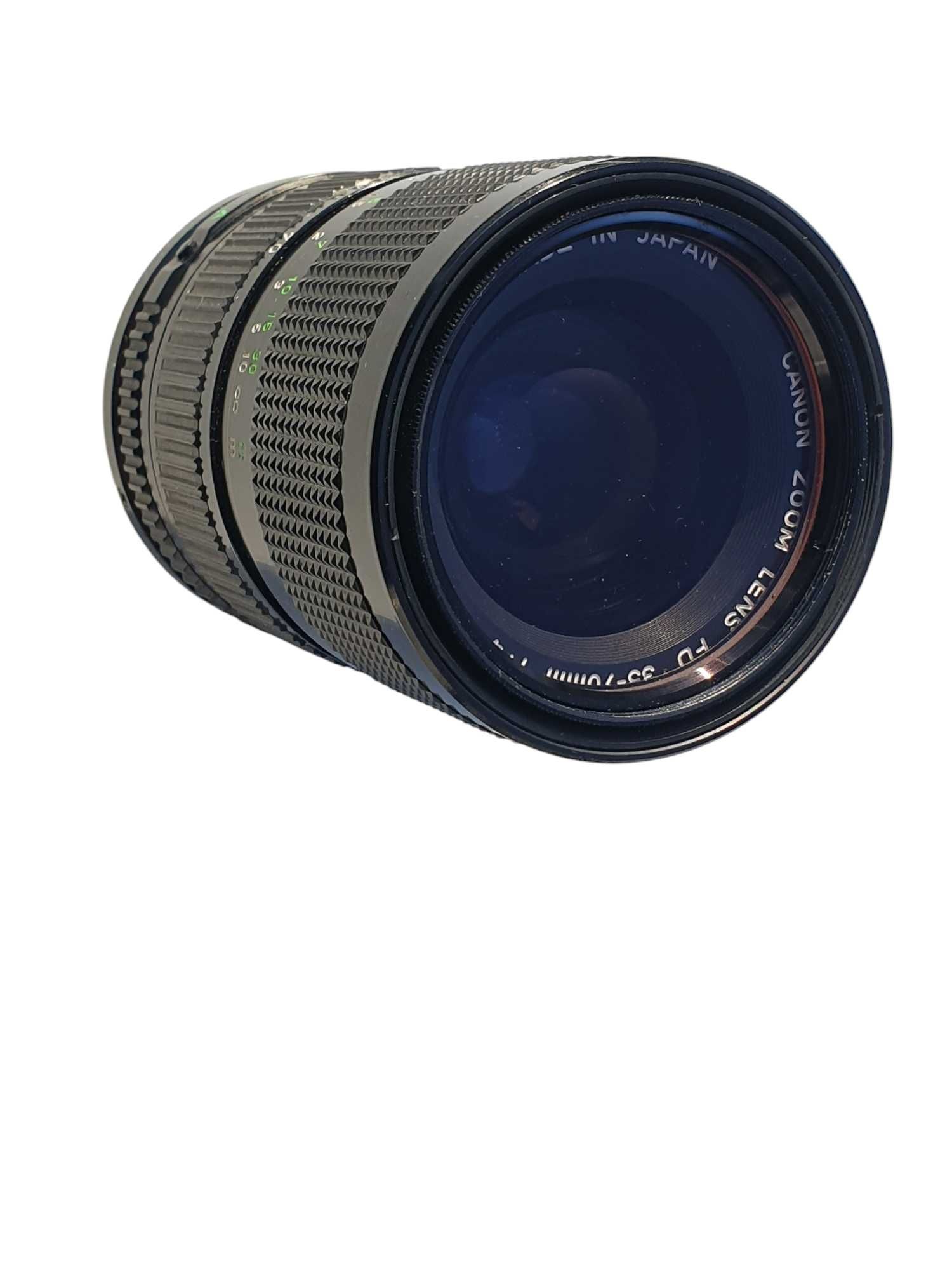 Stary obiektyw Canon Zoom Lens FD 35-70mm f/4 wraz z filtrem BEWETAR
