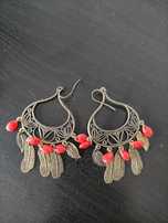Brincos  marca Avon