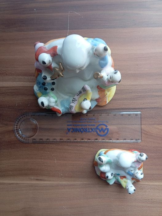 Buda de fertilidade em porcelana