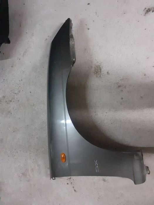 Guarda lamas passageiro daewoo nubira ano 2000
