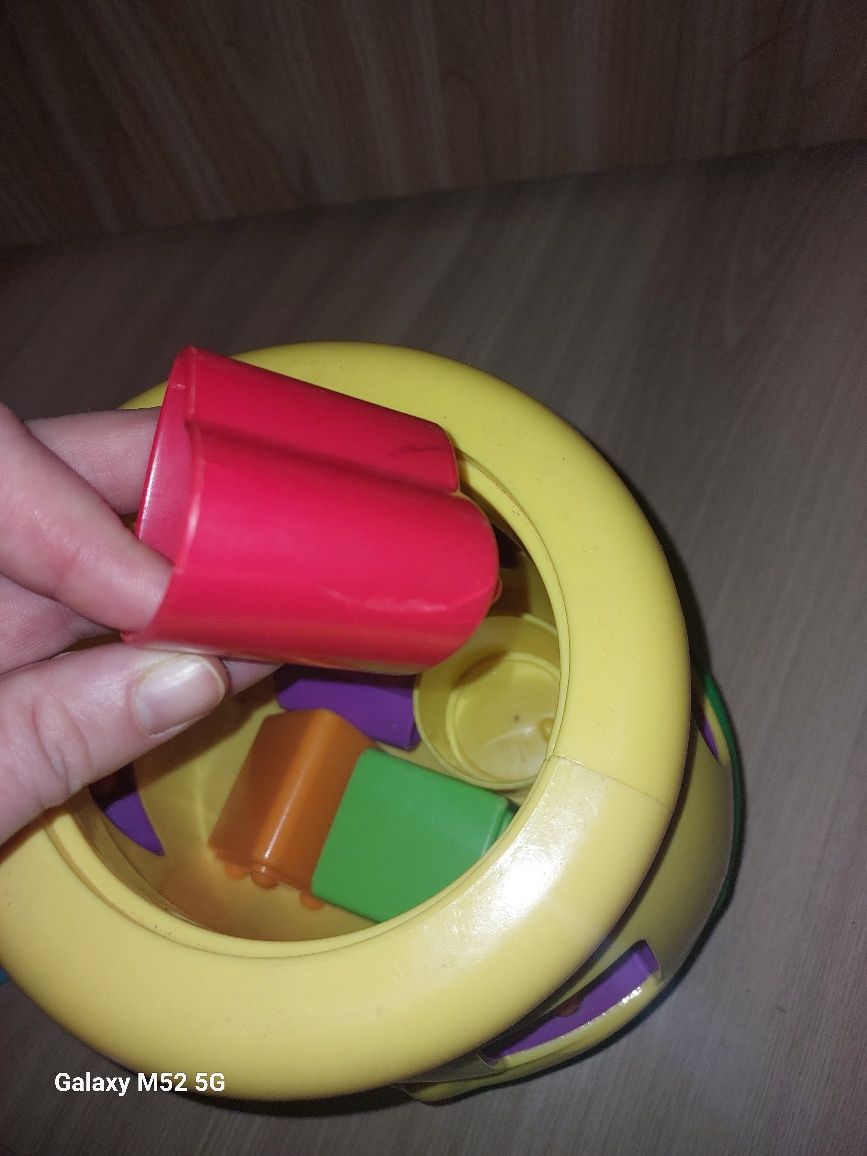 Garnuszek Fisher price sorter muzyka świeci