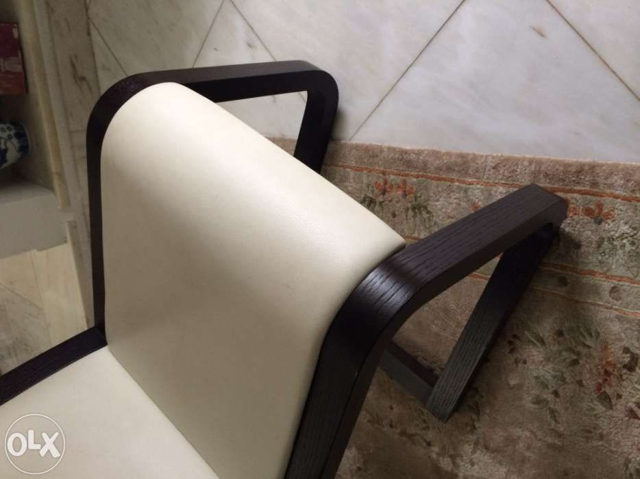 Cadeiras design Wengue e pele