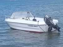 Barco motor atrelado