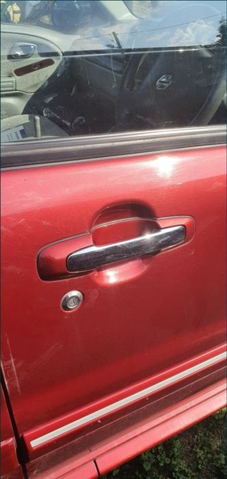 Suzuki Grand Vitara klamka chrom