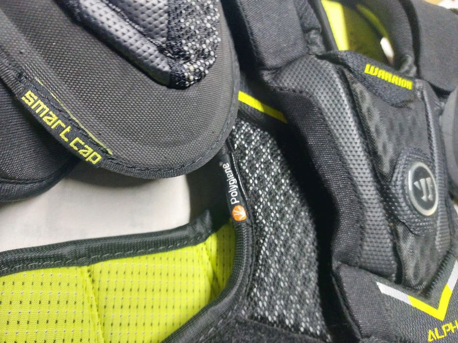 Naramiennik  hokejowy Warrior Alpha .rozm. L.