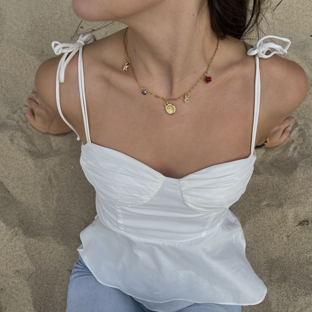 Colar Charm Necklace dourado com pendentes | Concha, olho grego…