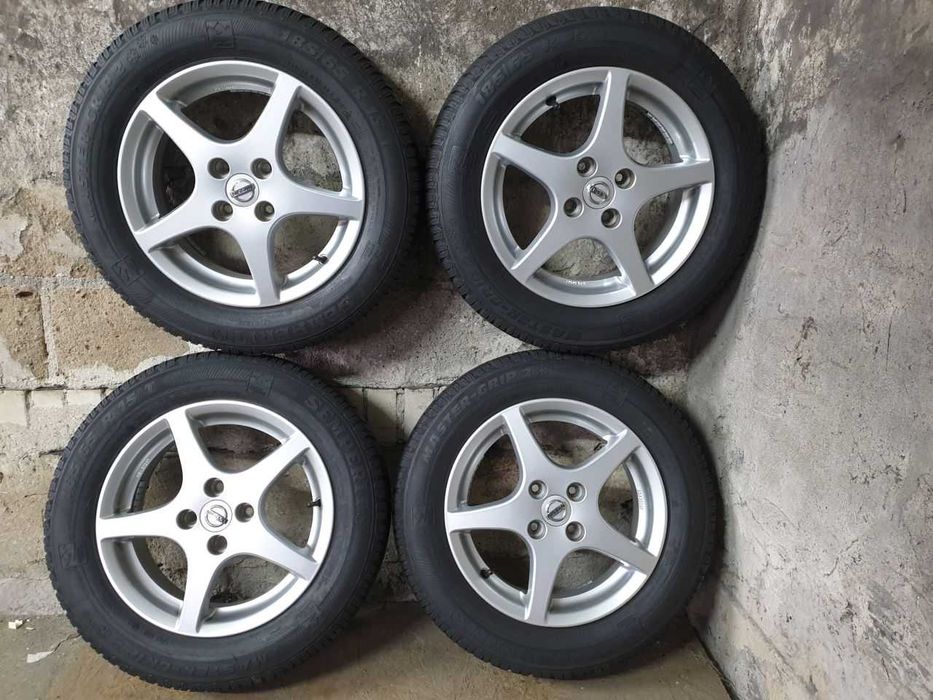 Felgi alu Nissan R15 4x100 opony zimowe 185/65R15 5,8mm Semperit