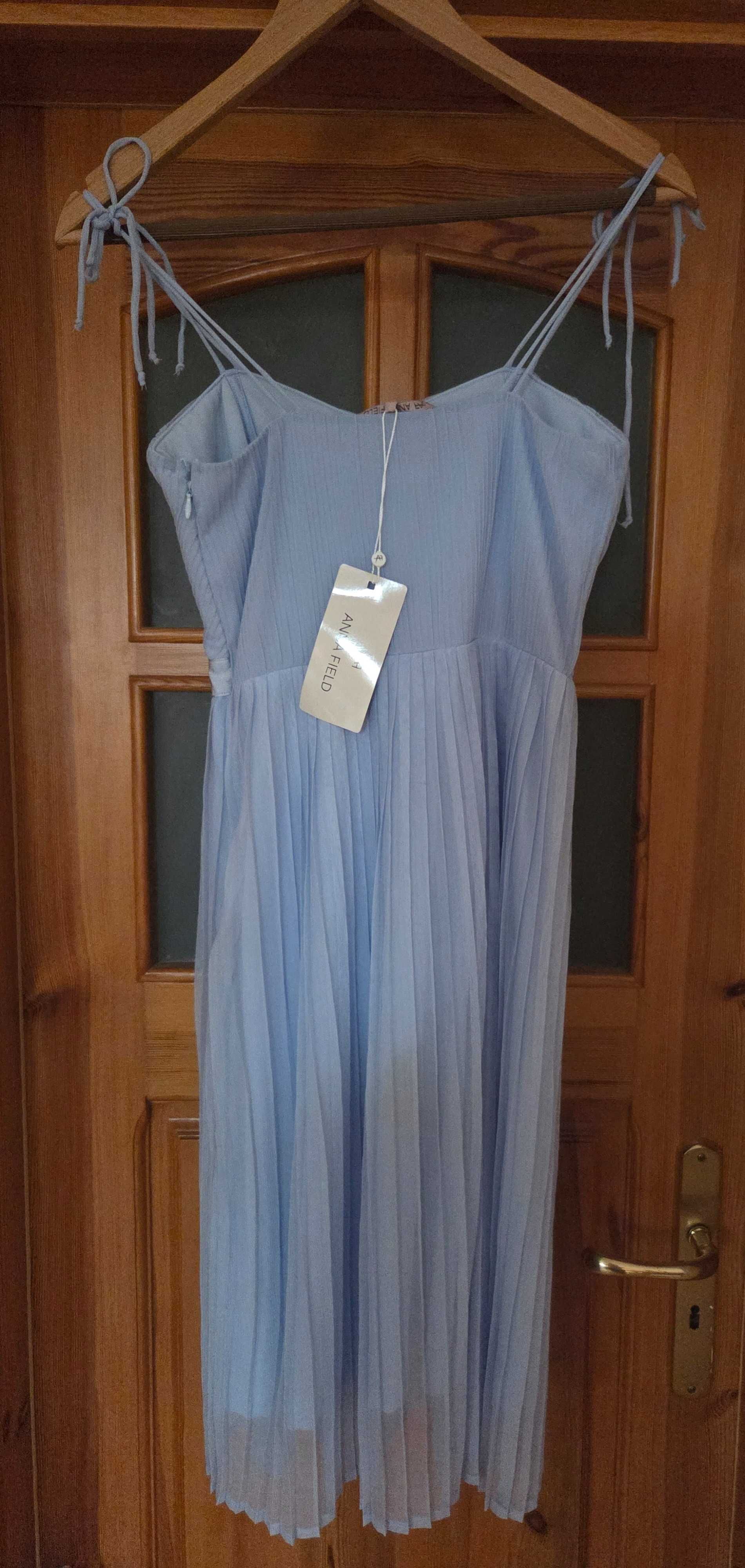 Nowa elegancka sukienka