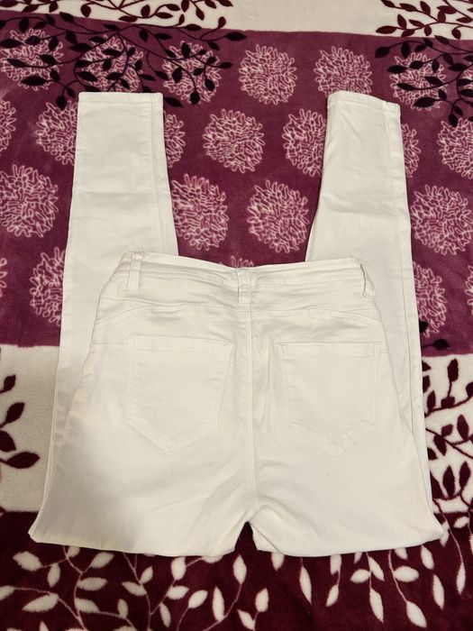 Calças de ganga brancas