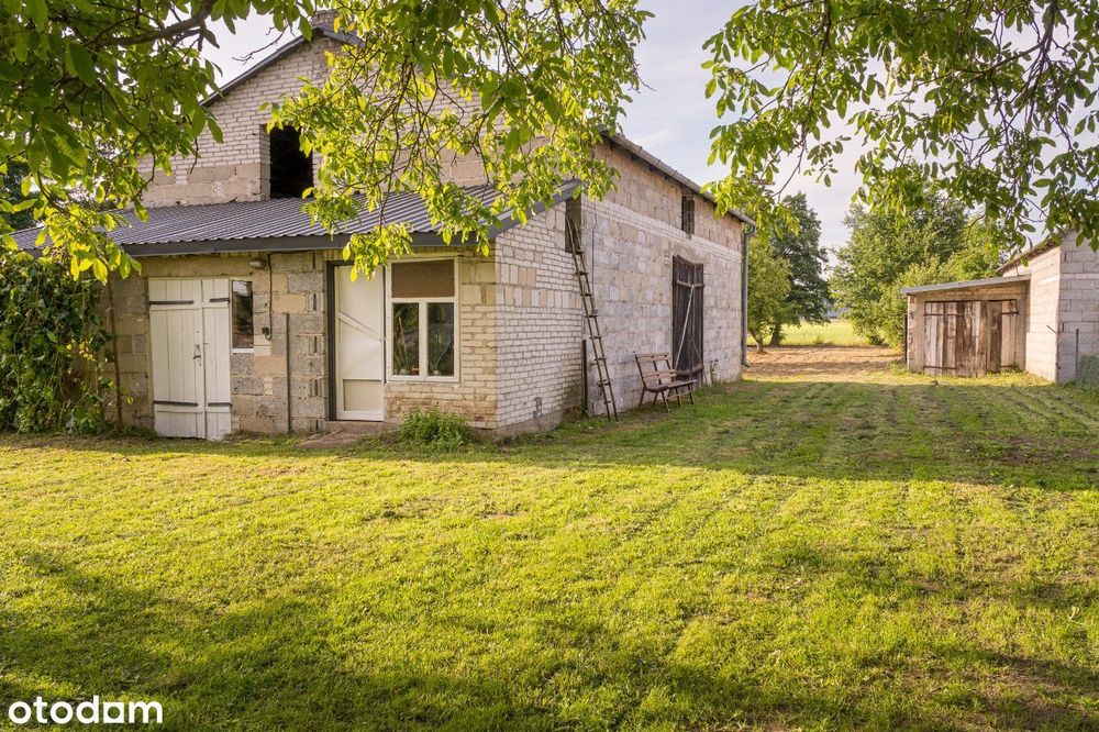 DZIAŁKA BUDOWLANA z budynkami gospodarczymi [warunki zabudowy]
