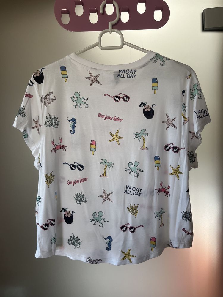 Biała koszulka z kolorowymi nadrukami H&M