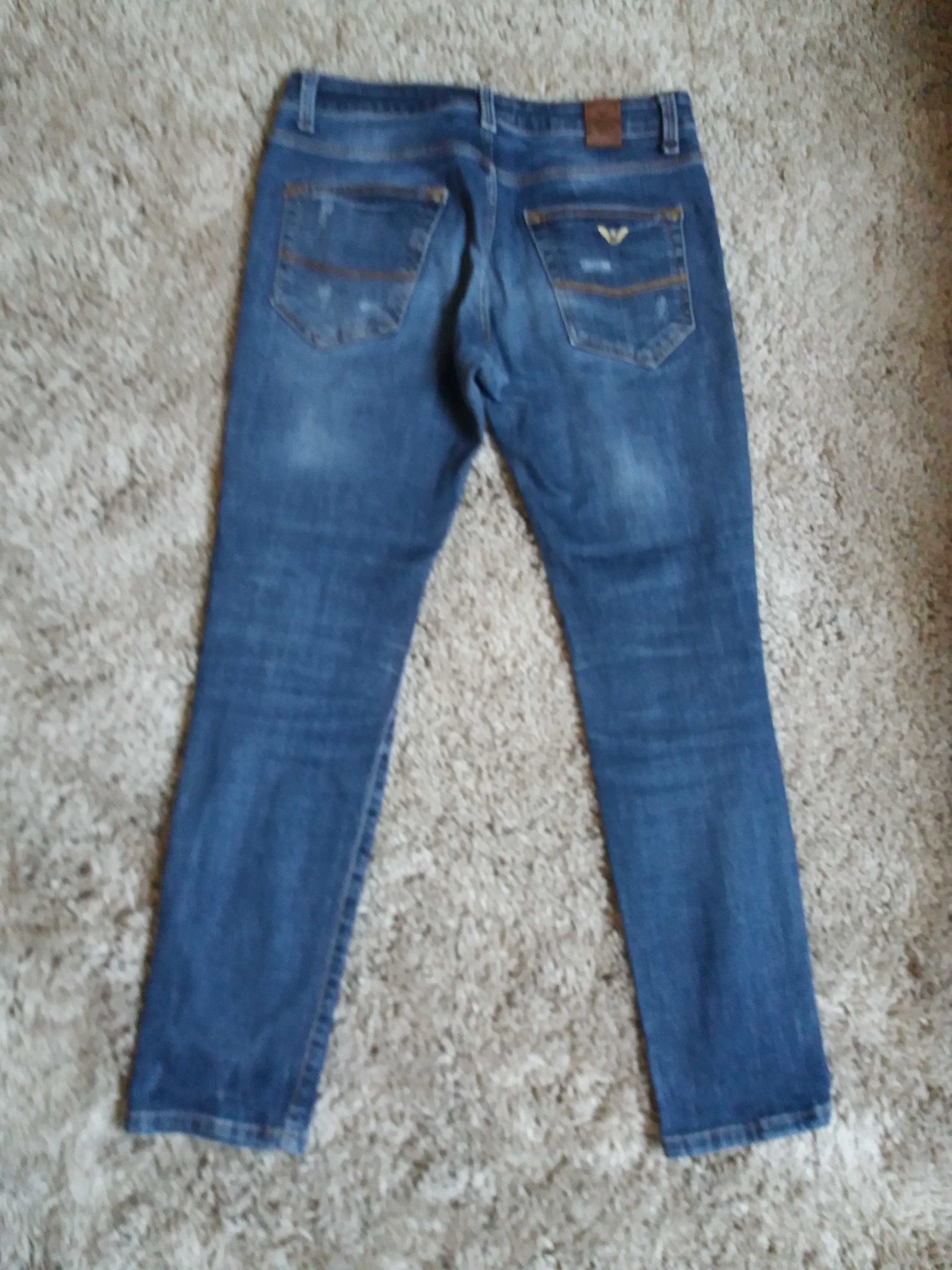 Dżinsy niebieskie z przetarciami Facchino Jeans