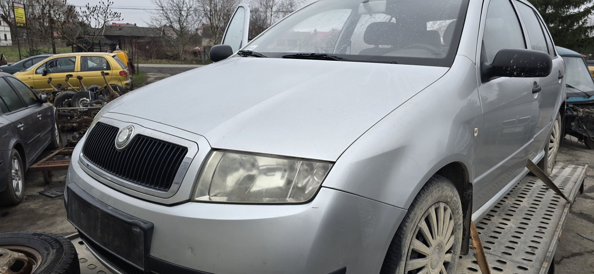 Drzwi zderzak  lampa 9102 Skoda Fabia I silnik 1,4części