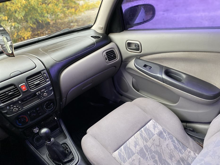 Nissan Almera газ/бензин