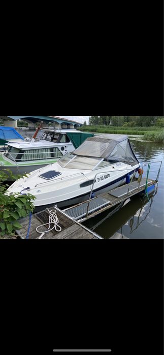 Sprzedam łódź motorową, motorówka + stojak na łódź.