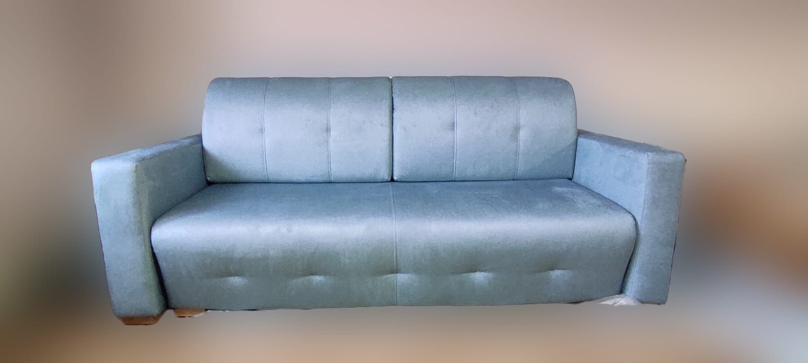 Rozkładana sofa na bonelu z  pojemnikiem na pościel.