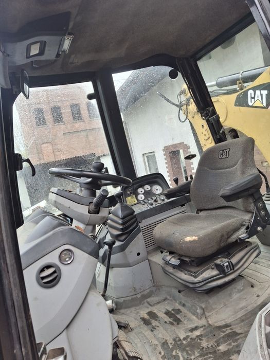 Koparko-ładowarka CAT 428E