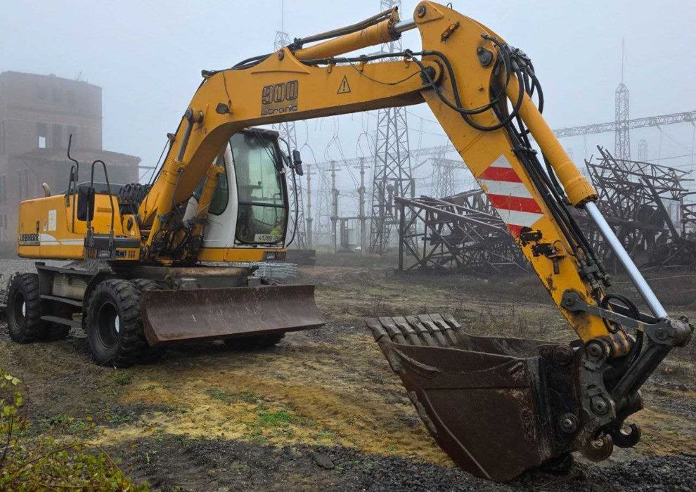 Услуги полноповоротного колесного экскаватора Liebherr 900 Litronic