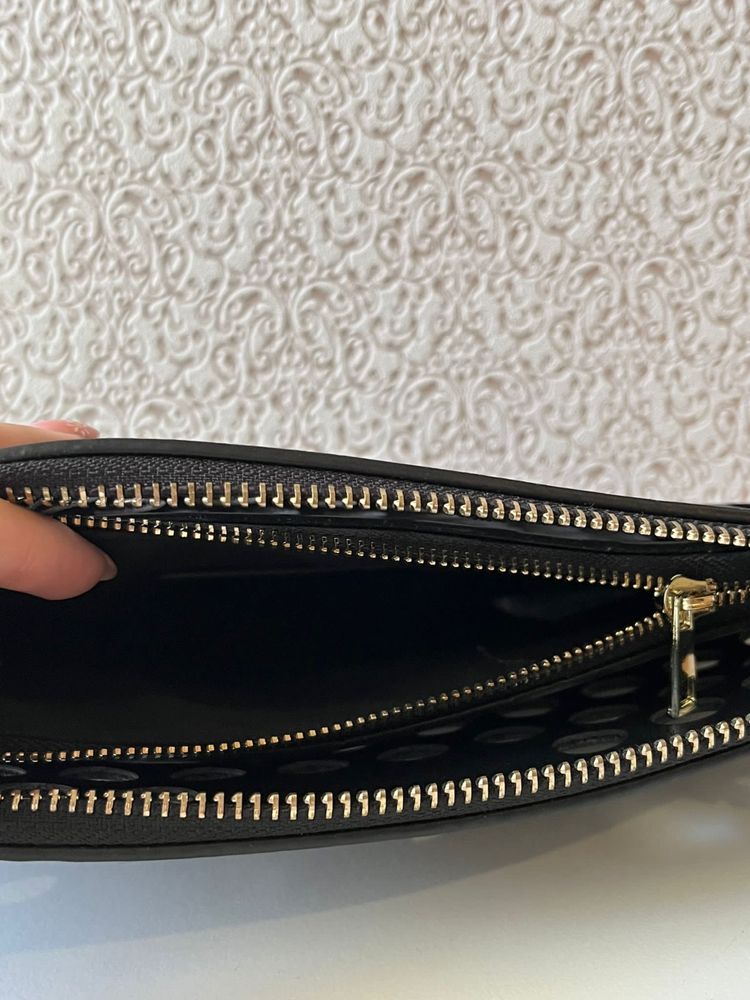 Clutch da marca ‘Lavand.’