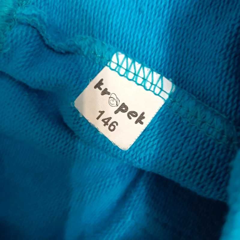 Niebieskie spodnie dresowe Kropek 146