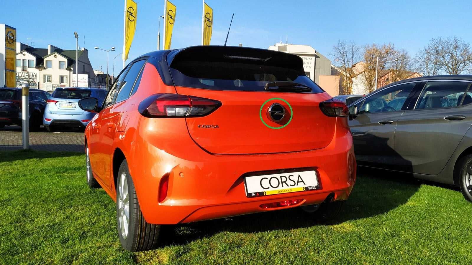 Znaczek Emblemat Mikro Styk Klamka Klapy Bagażnika Opel Corsa F Nowy