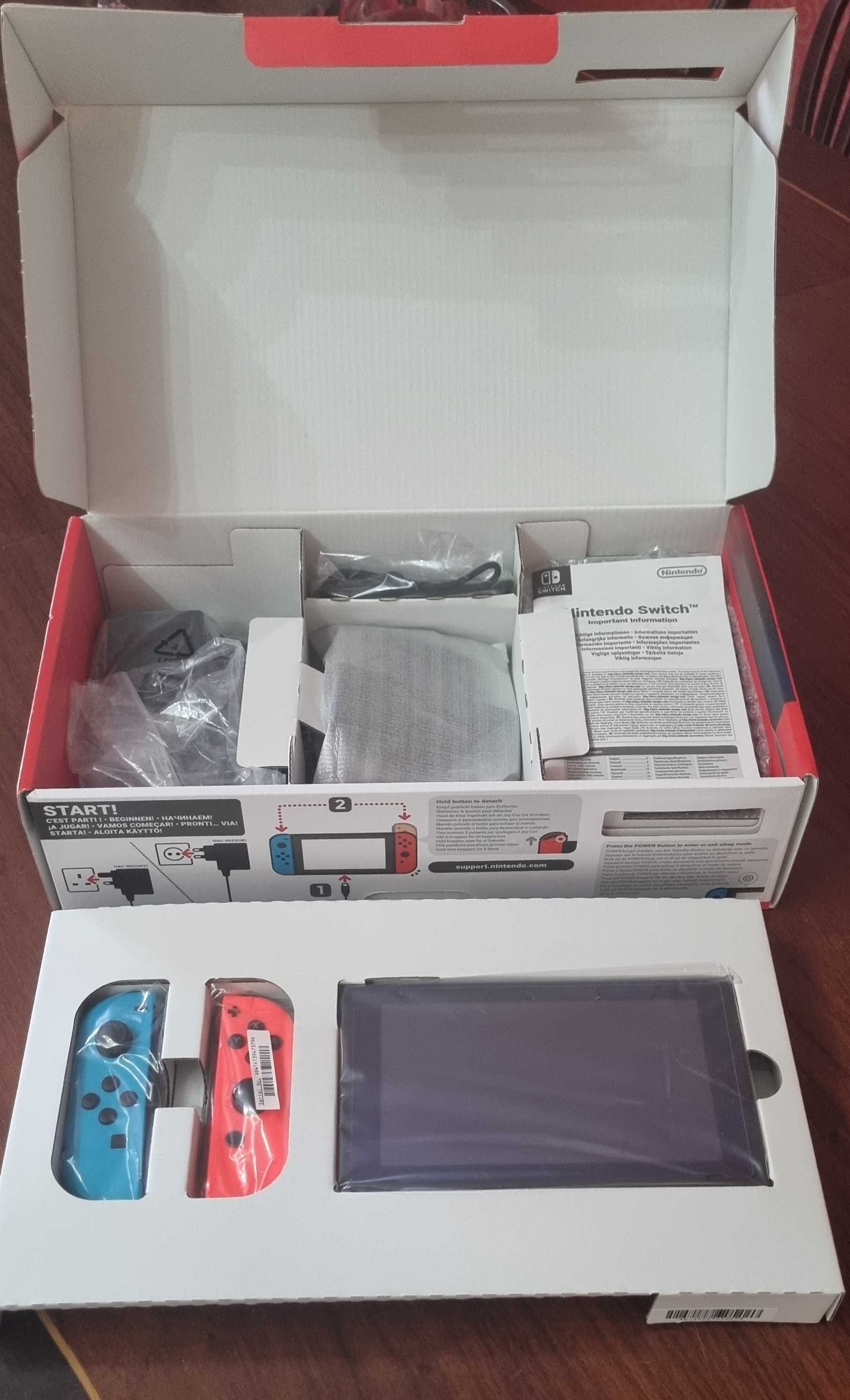 Nintendo Switch V2 + Caixa Original + 2 Jogos + microSD 256GB – 260 €