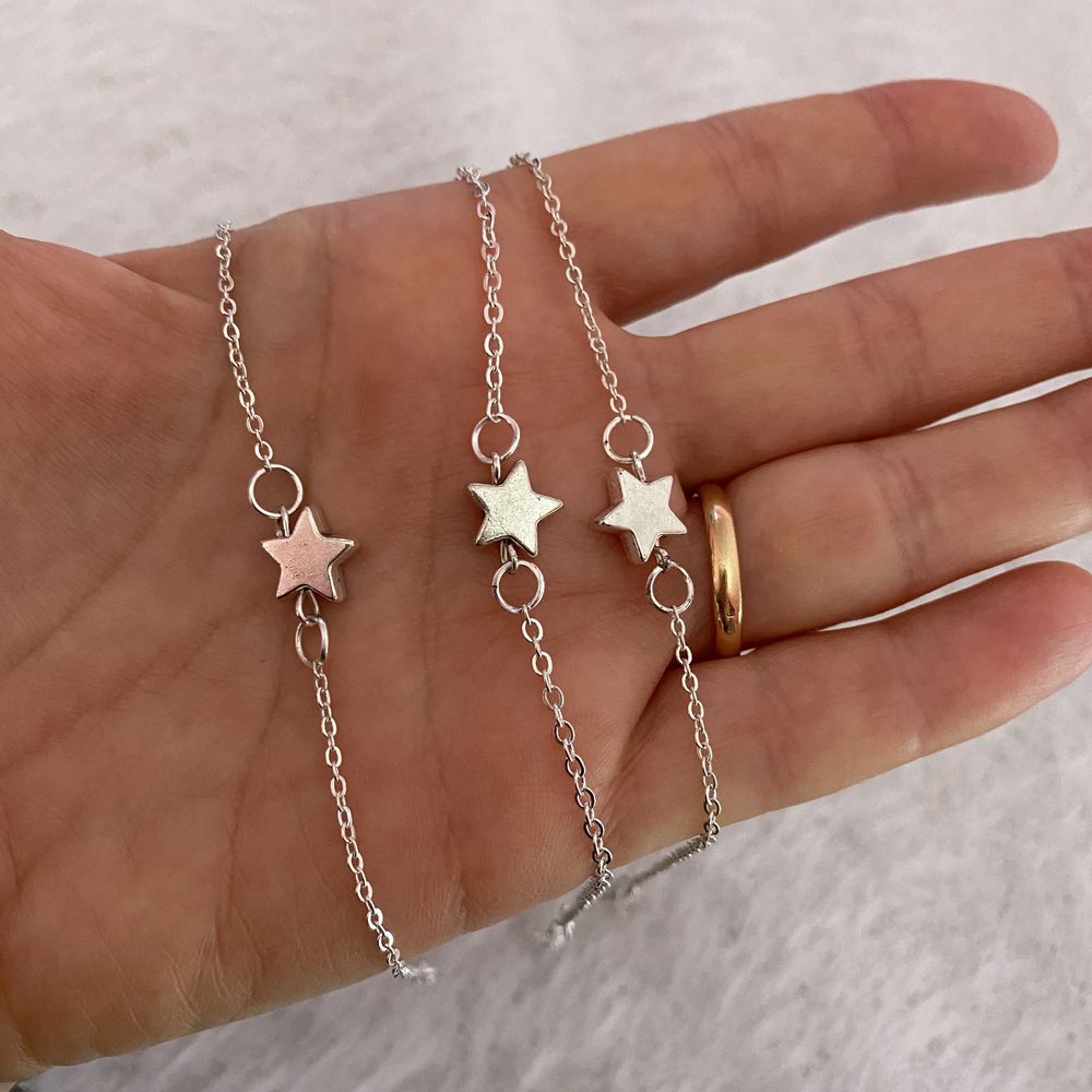 Conjunto de 3 pulseiras em prateado com Estrela (novas)