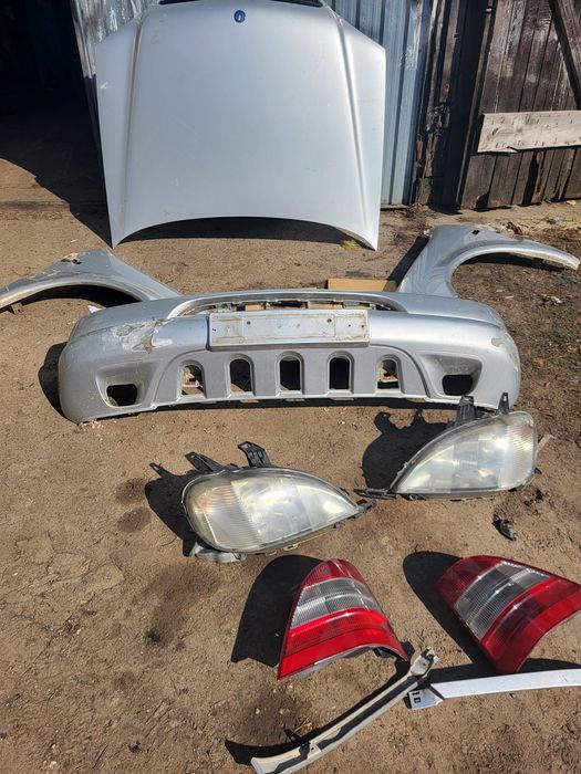 Zderzak maska Lampy Mercedes Ml w 163